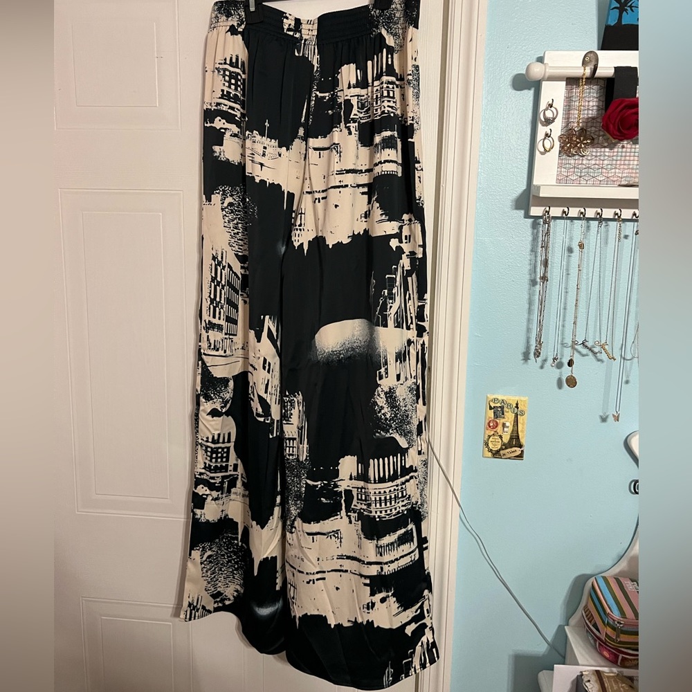 a cute, silky, black and white patterned, wide legged pants